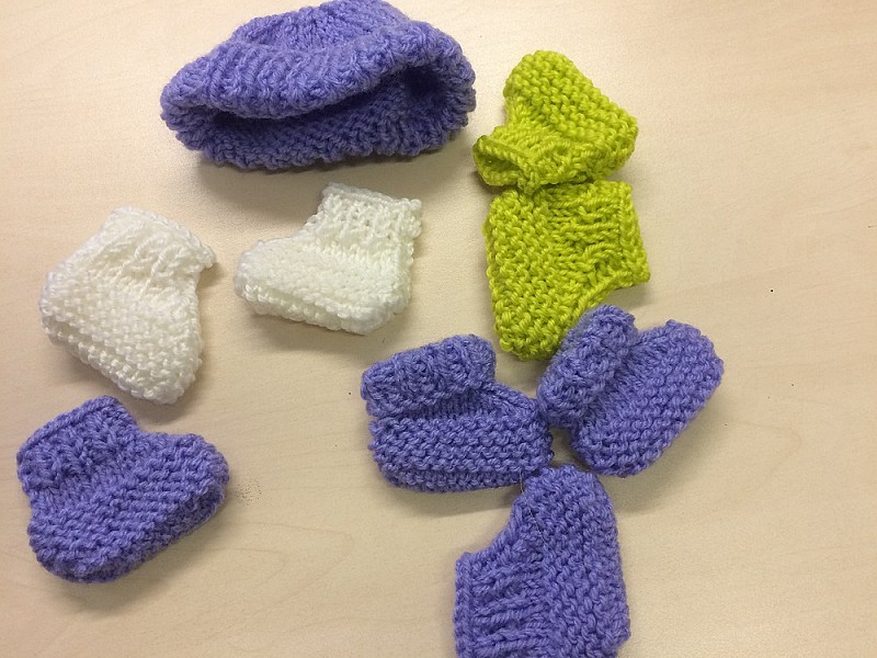 Knitted socks and hood for premature babies